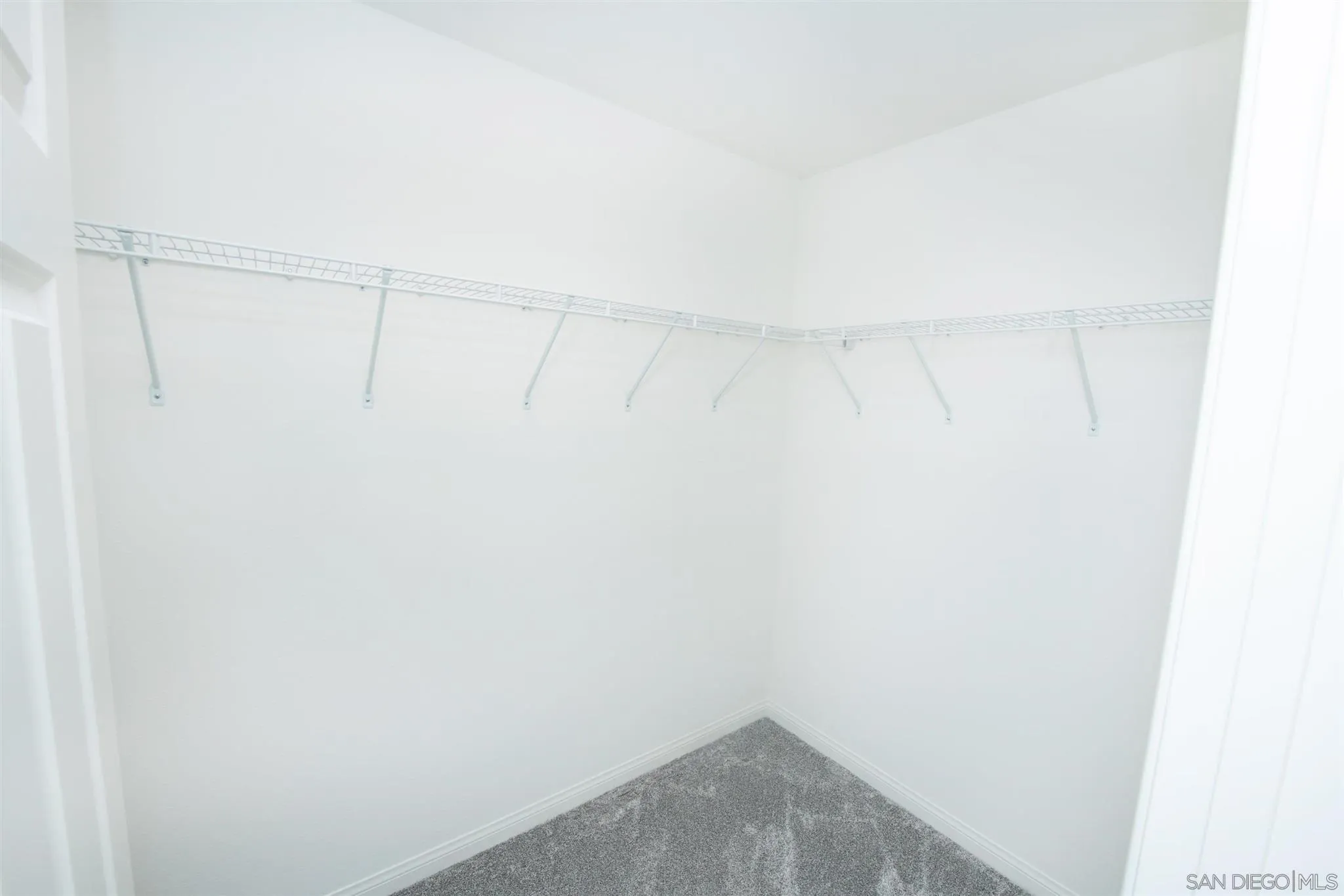 10711 Porter Terrace Spring Valley, CA 91978 - Photo 16 of 17 a view of a room with racks on the wall