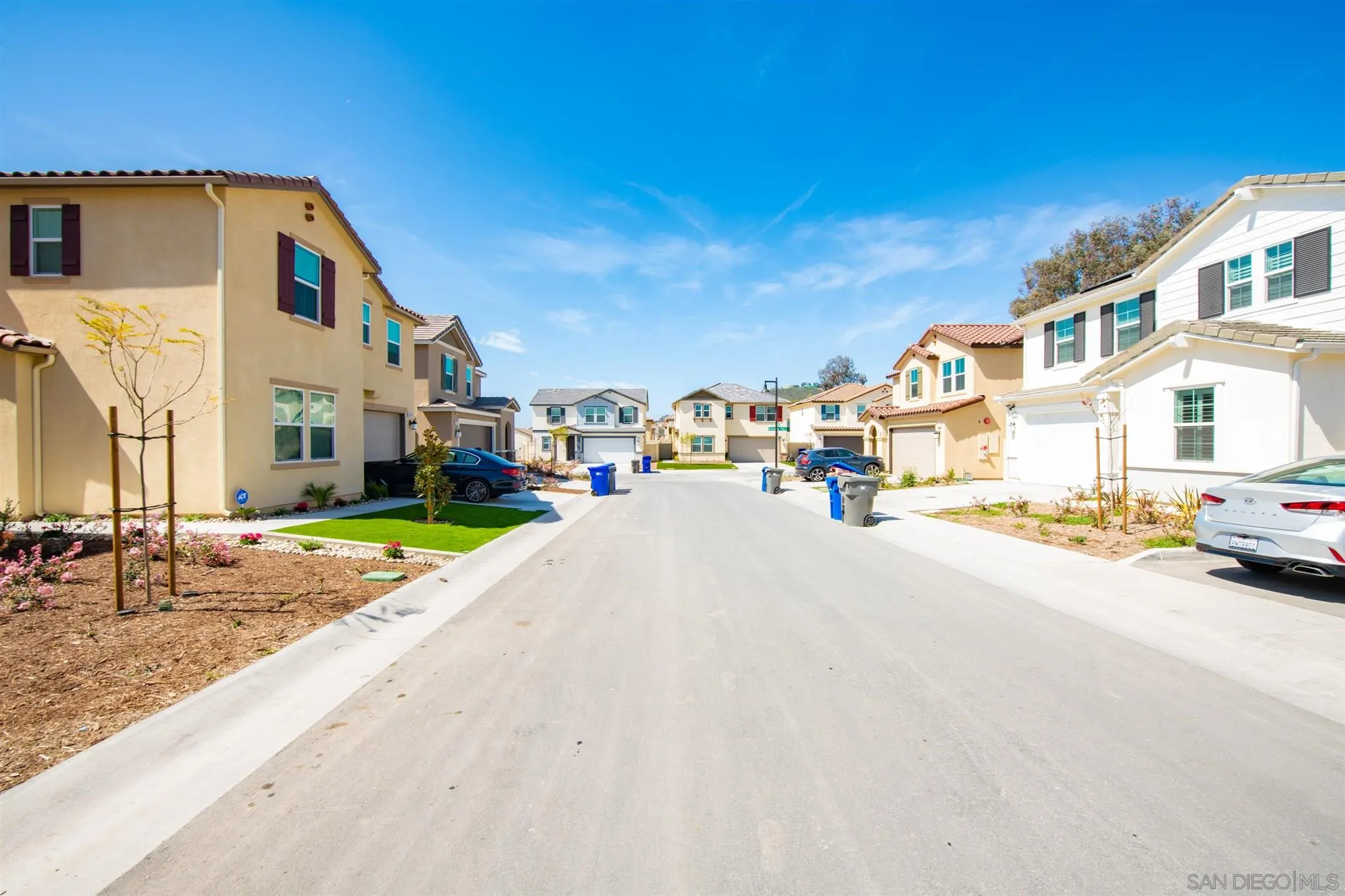 10711 Porter Terrace Spring Valley, CA 91978 - Photo 3 of 17 a view of a street with a building in the background
