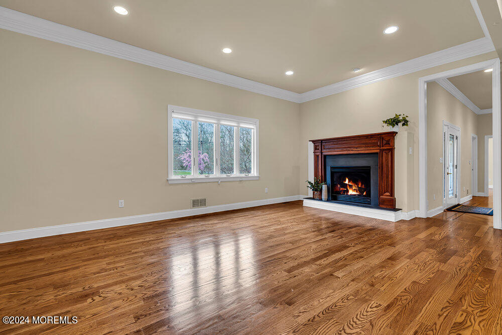 103 Obre Road Colts Neck, NJ 07722 - Photo 12 of 64 10_Dining Room to Fireplace