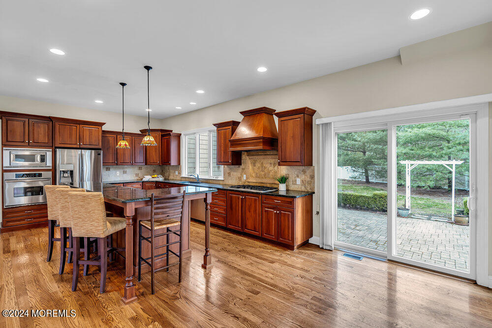 103 Obre Road Colts Neck, NJ 07722 - Photo 19 of 64 17_Kitchen_Sliders