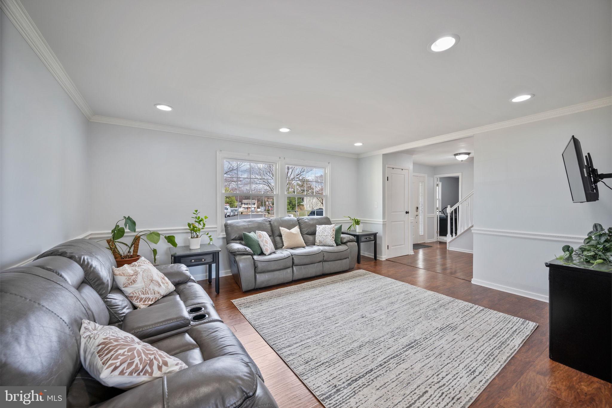 645 Ridgefield Court Glen Burnie, MD 21061 - Photo 11 of 62 a living room with furniture and a couch