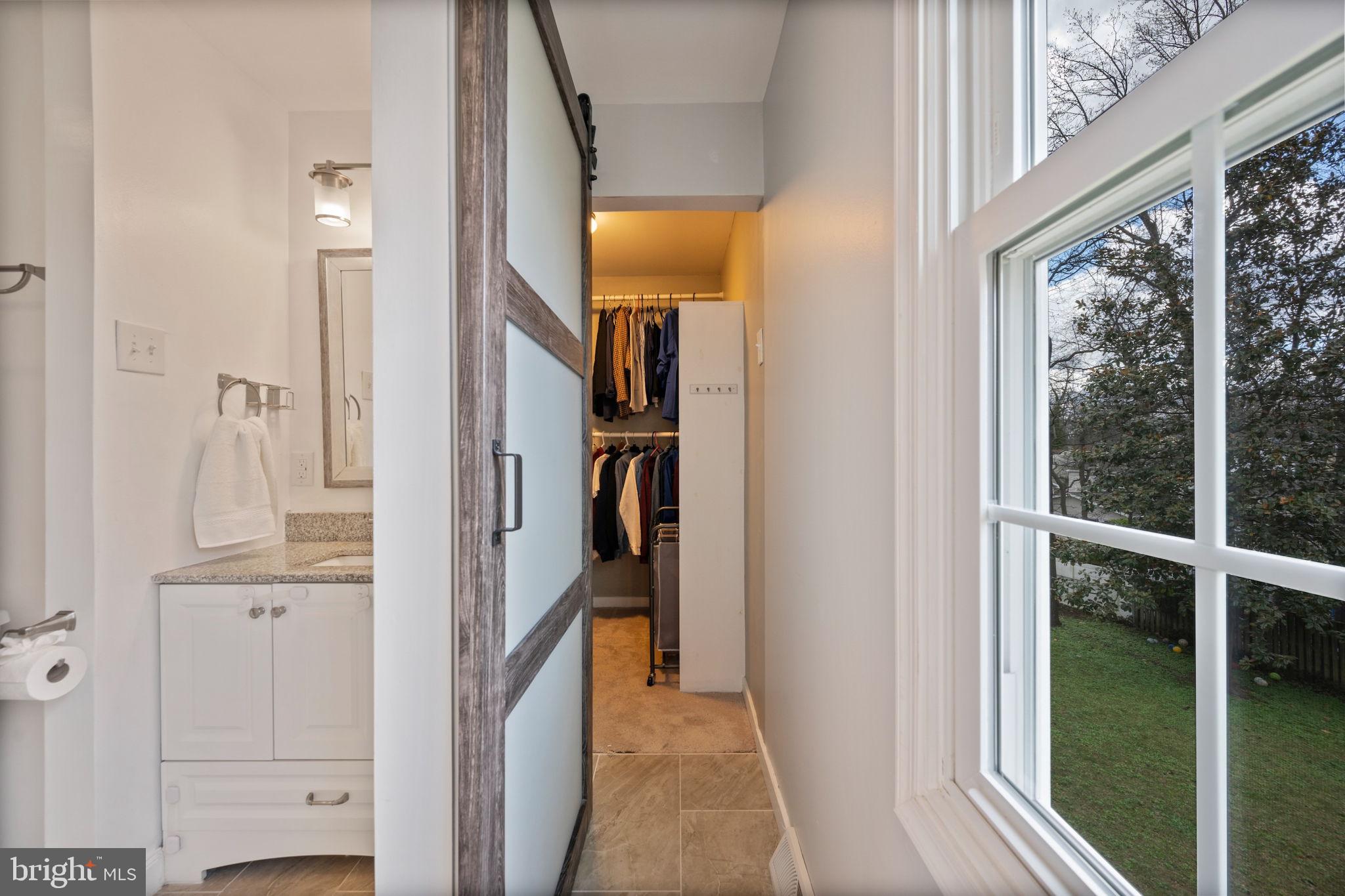645 Ridgefield Court Glen Burnie, MD 21061 - Photo 22 of 62 a view of a hallway with wooden floor and entryway