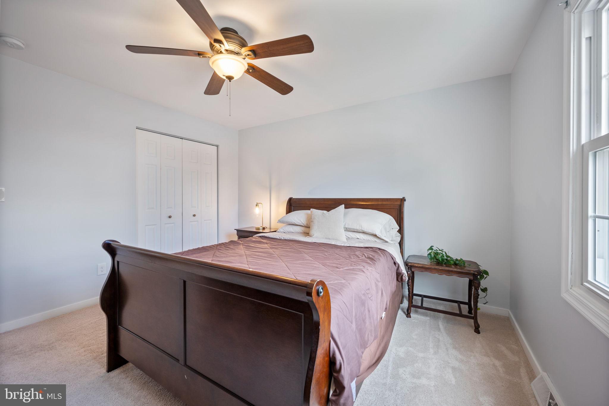 645 Ridgefield Court Glen Burnie, MD 21061 - Photo 25 of 62 a bedroom with a bed and a window