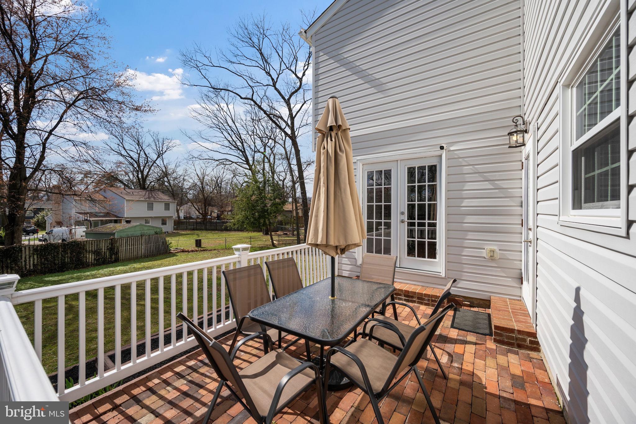 645 Ridgefield Court Glen Burnie, MD 21061 - Photo 37 of 62 a view of a patio with iron fence