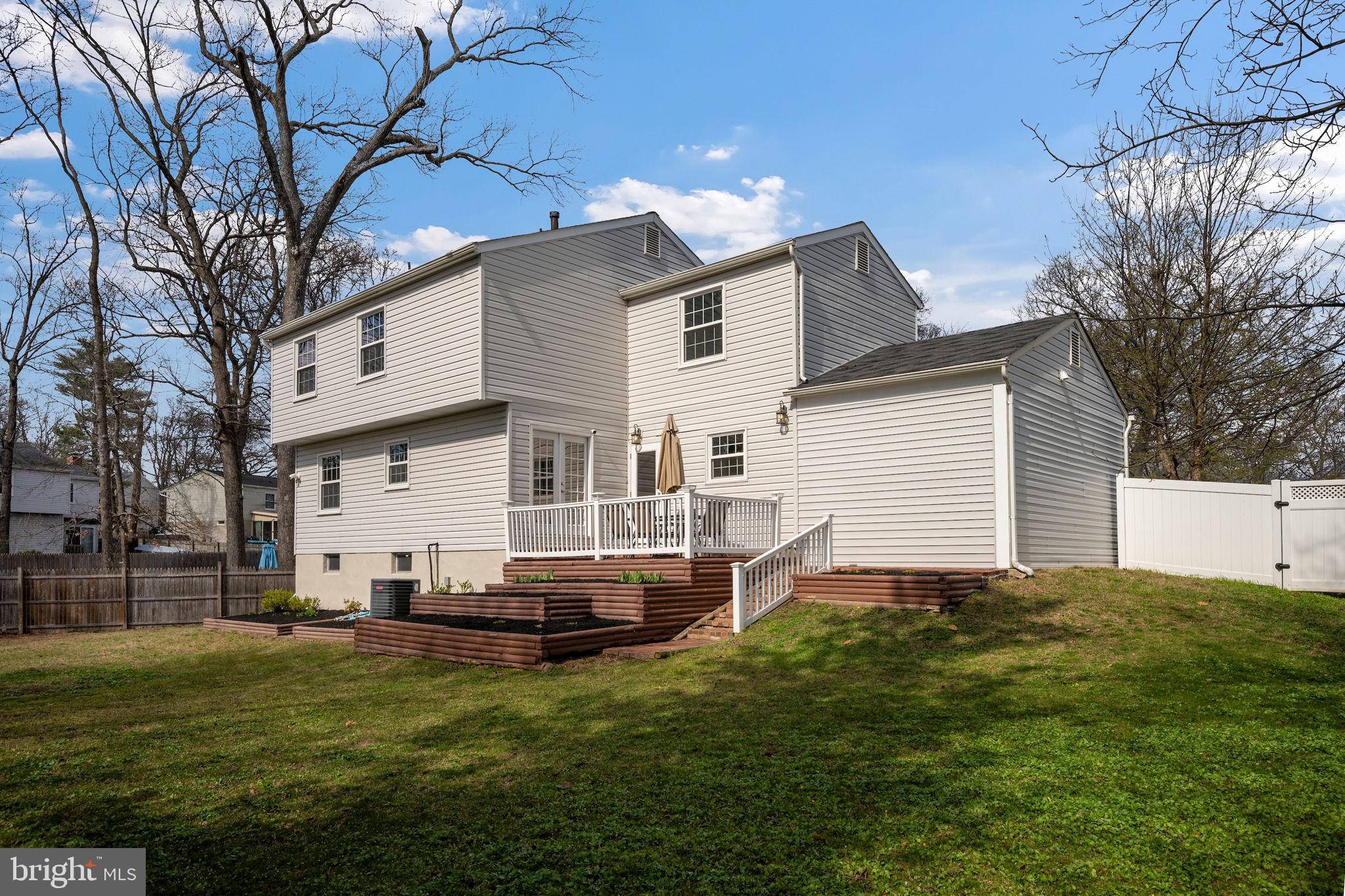 645 Ridgefield Court Glen Burnie, MD 21061 - Photo 44 of 62 a view of a house with a backyard