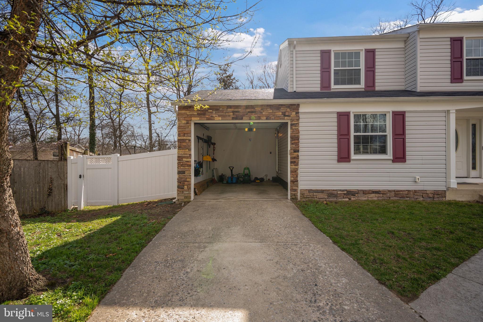 645 Ridgefield Court Glen Burnie, MD 21061 - Photo 46 of 62 a view of a house with a yard
