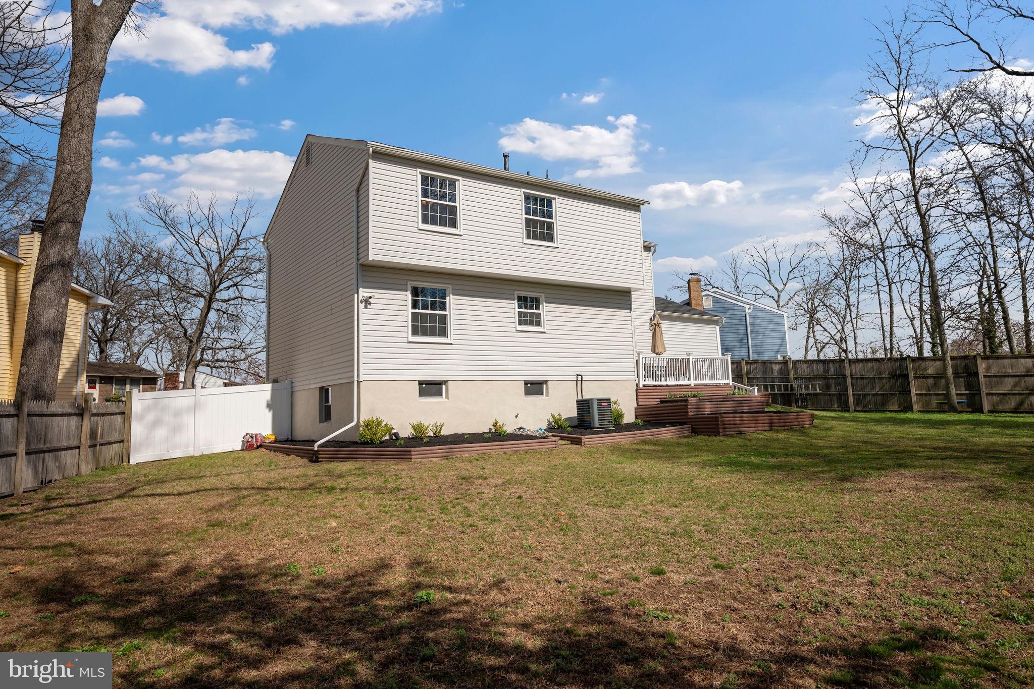 645 Ridgefield Court Glen Burnie, MD 21061 - Photo 47 of 62 a view of a house with a yard