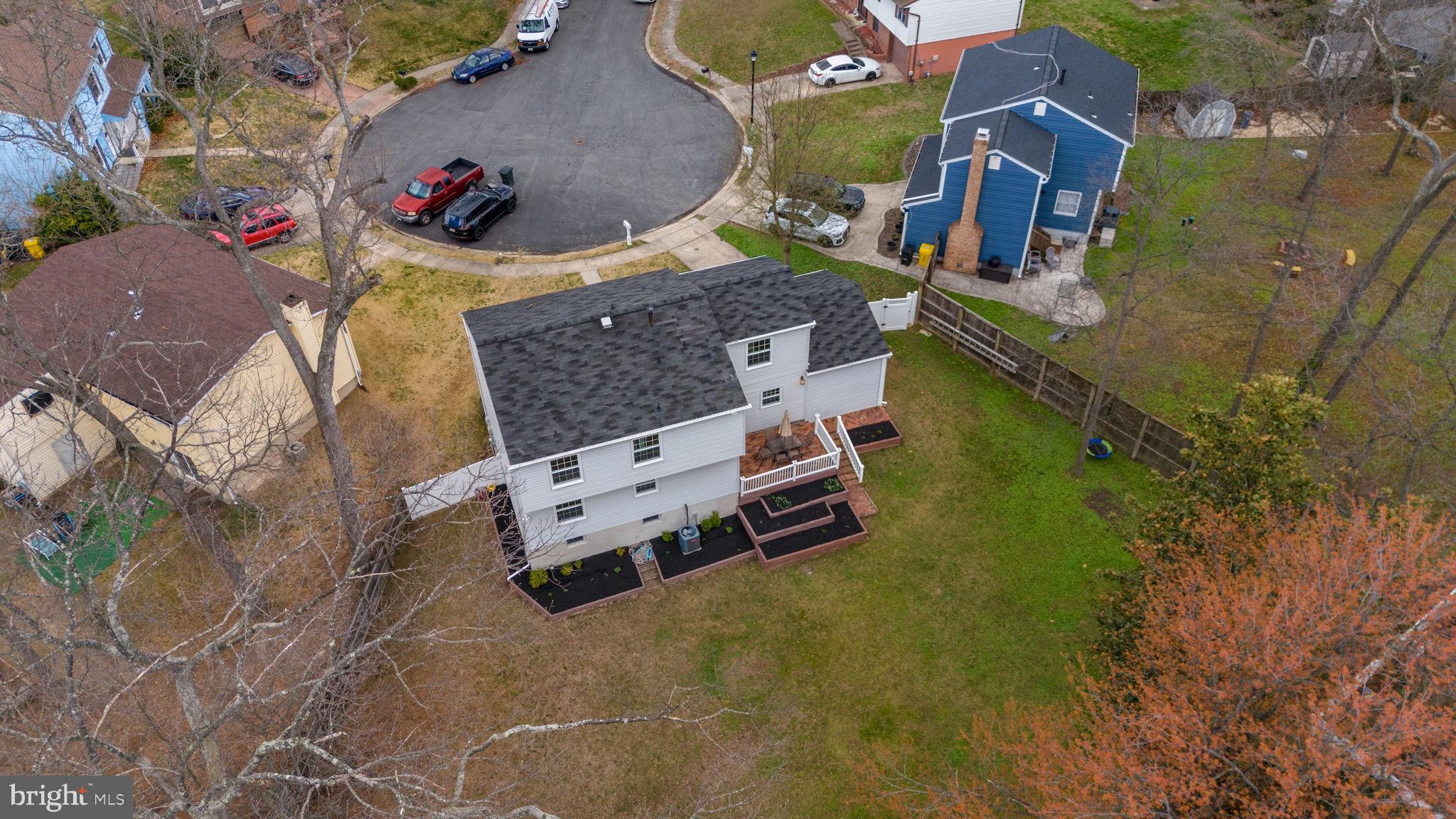 645 Ridgefield Court Glen Burnie, MD 21061 - Photo 52 of 62 an aerial view of a house with a yard