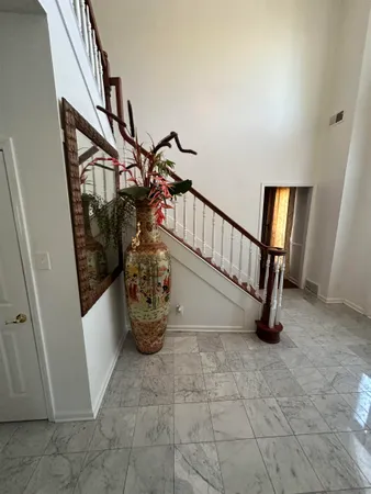 a view of an empty room and a windows