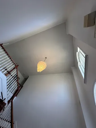a view of a livingroom with a staircase
