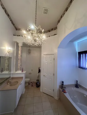 a view of hallway with wooden floor