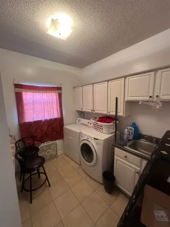 a spacious bathroom with a tub and shower