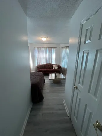 a hallway with a couch