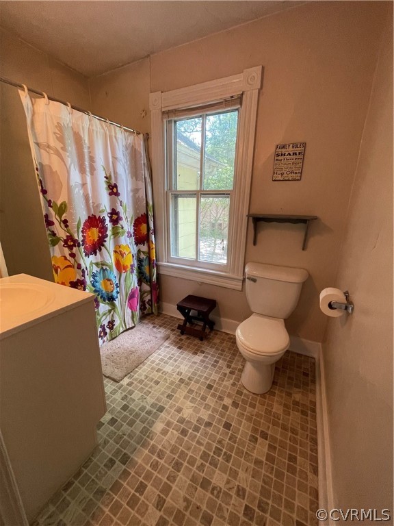 320 Main St Point West Point, VA 23181 - Photo 18 of 36 a very nice looking room with a large window and a couch
