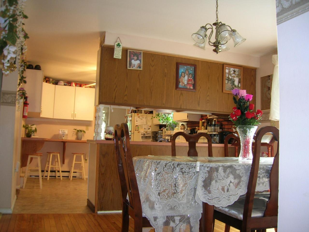 1612 Maple Road Effort, PA 18330 - Photo 2 of 7 a view of a dining room with furniture and chandelier