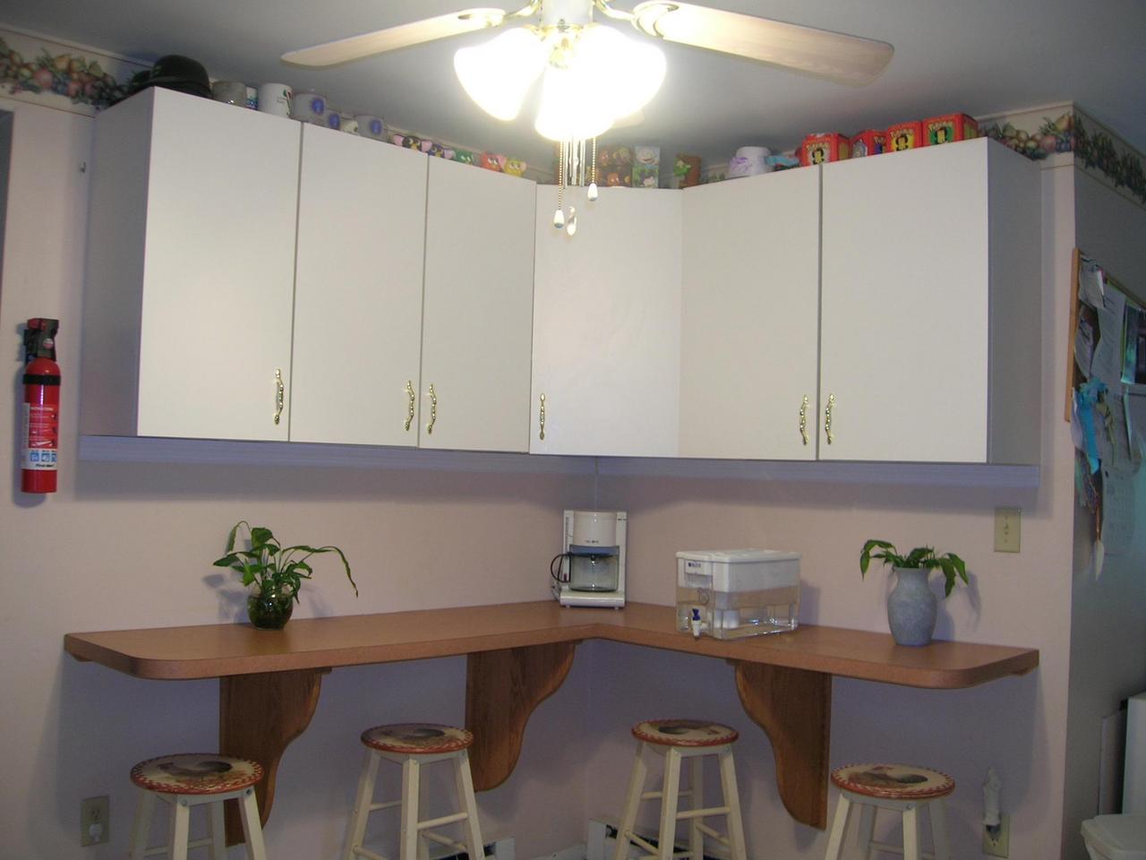 1612 Maple Road Effort, PA 18330 - Photo 5 of 7 a room with a table chairs and a refrigerator
