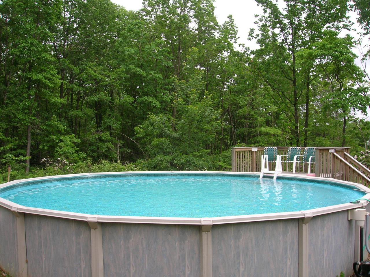 1612 Maple Road Effort, PA 18330 - Photo 7 of 7 a view of a swimming pool with a yard