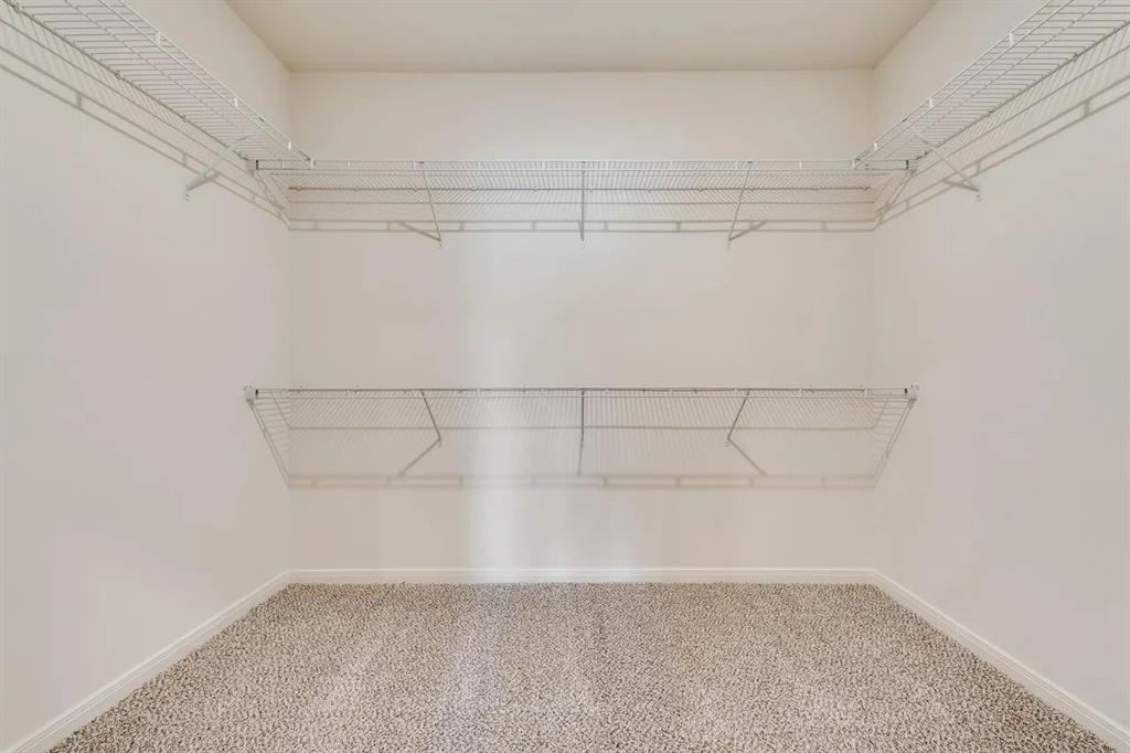 912 Mallorie Lane Ferris, TX 75125 - Photo 19 of 24 Spacious closet with carpet