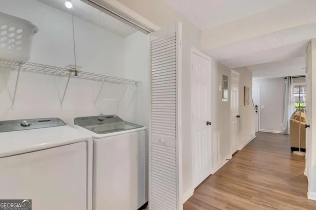 a utility room with dryer and washer