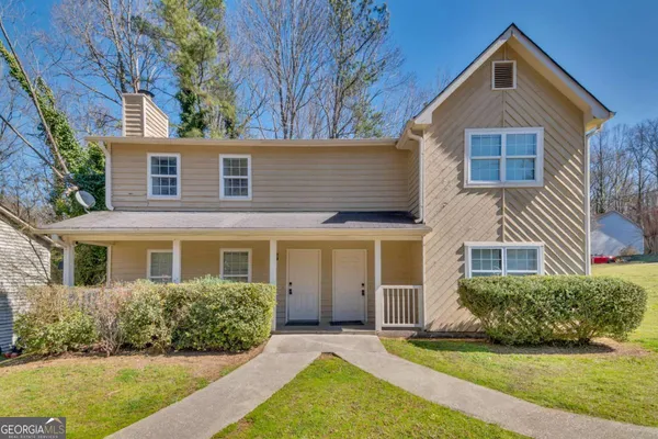 front view of a house and a yard