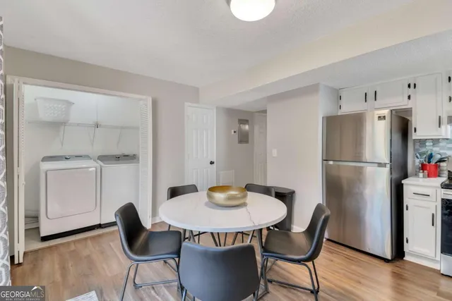 a table and chairs in a kitchen