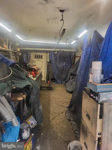 a view of a backyard with sitting area