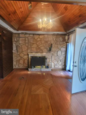 a view of a livingroom with a fireplace