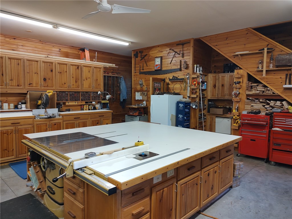 160 Sentell Road Williamston, SC 29697 - Photo 37 of 45 A well-appointed workshop with ample storage and robust work surfaces.