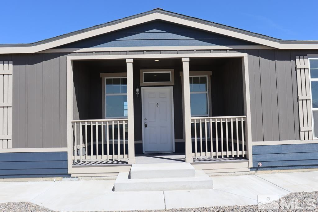 7275 West Rose Creek Road Winnemucca, NV 89445 - Photo 2 of 25 a view of entrance gate of a house