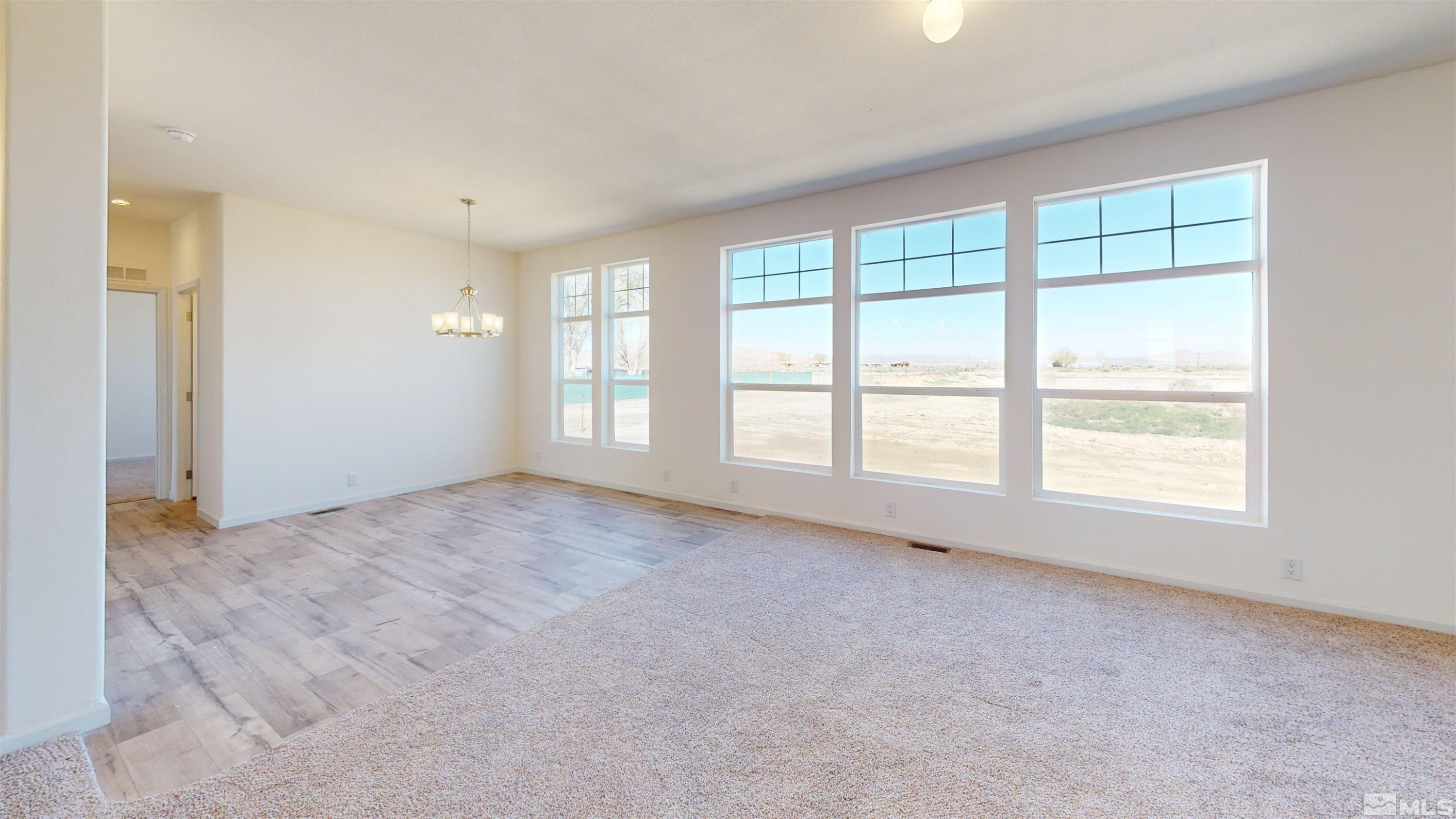 7275 West Rose Creek Road Winnemucca, NV 89445 - Photo 10 of 25 a view of an empty room with a window