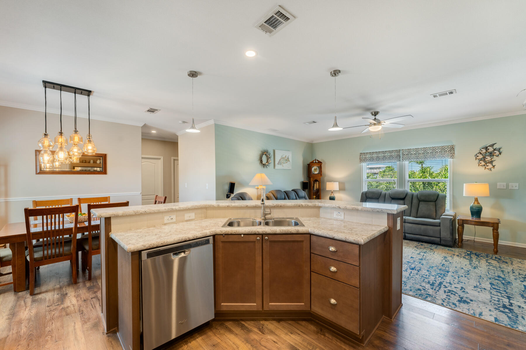 650 64th Street Marathon, FL 33050 - Photo 13 of 45 a kitchen with a stove a sink dishwasher and a dining table with garden view