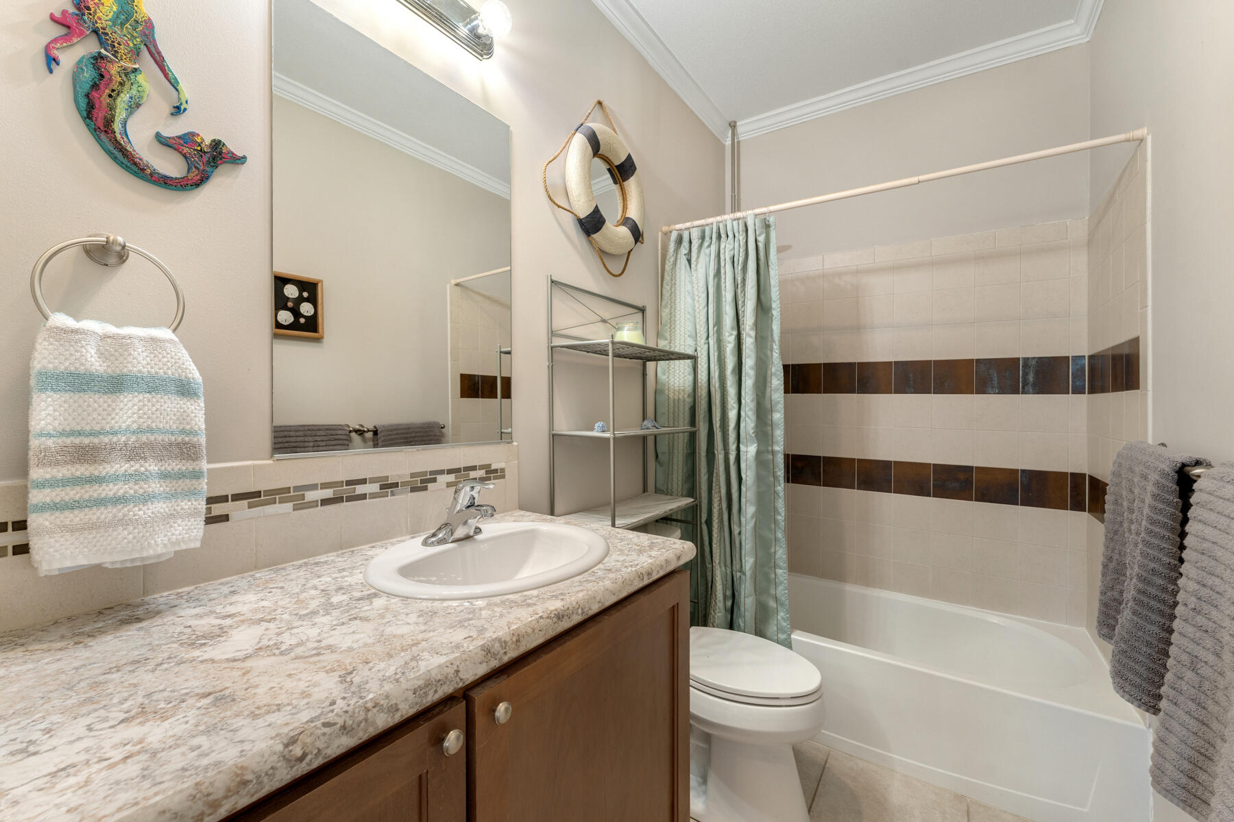 650 64th Street Marathon, FL 33050 - Photo 27 of 45 a bathroom with a sink a toilet and shower