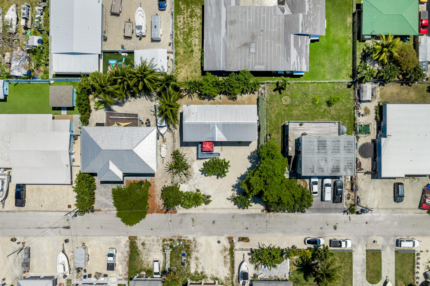 650 64th Street Marathon, FL 33050 - Photo 42 of 45 an aerial view of multiple houses with outdoor space