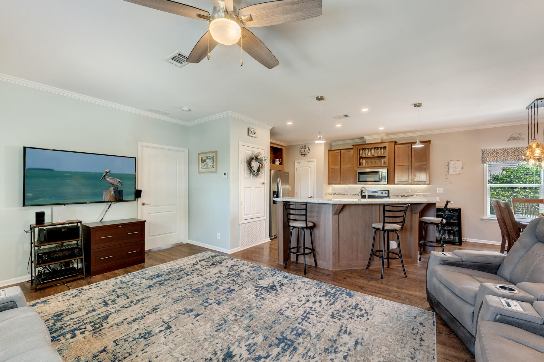 650 64th Street Marathon, FL 33050 - Photo 10 of 45 a living room with furniture a dining table and a flat screen tv