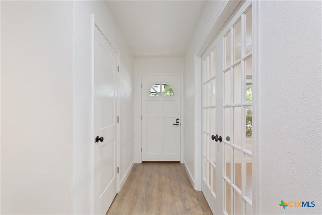 4412 Briar Cliff Road Temple, TX 76502 - Photo 6 of 35 a view of a hallway with wooden floor and closet