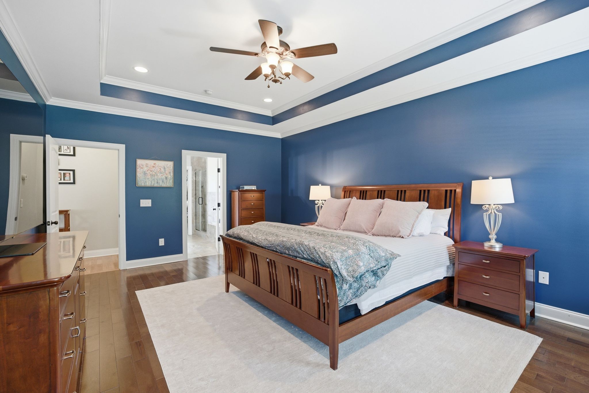 211 Fox Den Way Murfreesboro, TN 37130 - Photo 17 of 64 a spacious bedroom with a bed and a chandelier