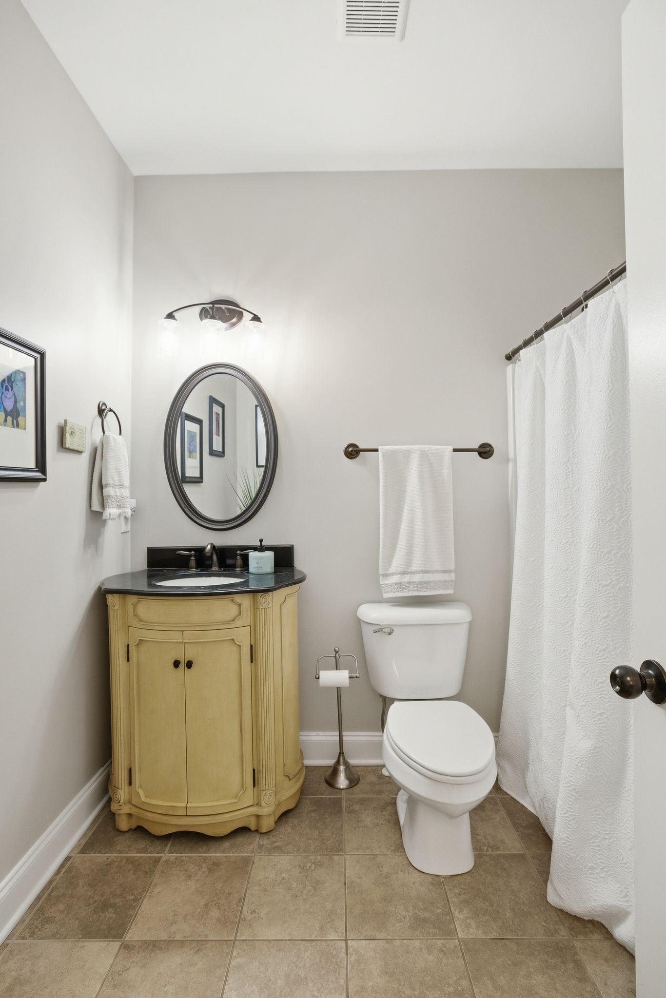 211 Fox Den Way Murfreesboro, TN 37130 - Photo 26 of 64 a white toilet sitting next to a bathroom sink