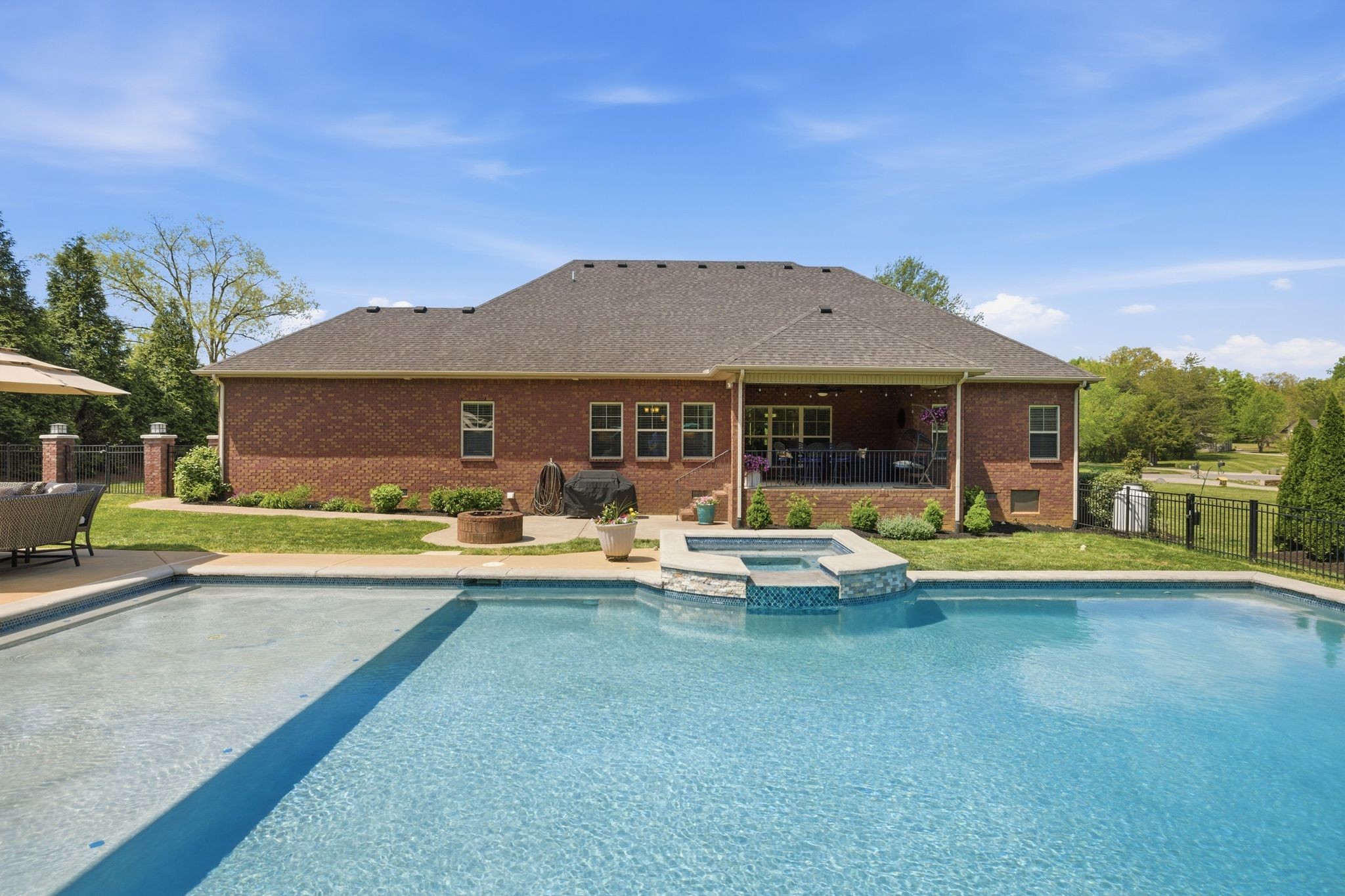 211 Fox Den Way Murfreesboro, TN 37130 - Photo 34 of 64 a view of a house with swimming pool and a yard