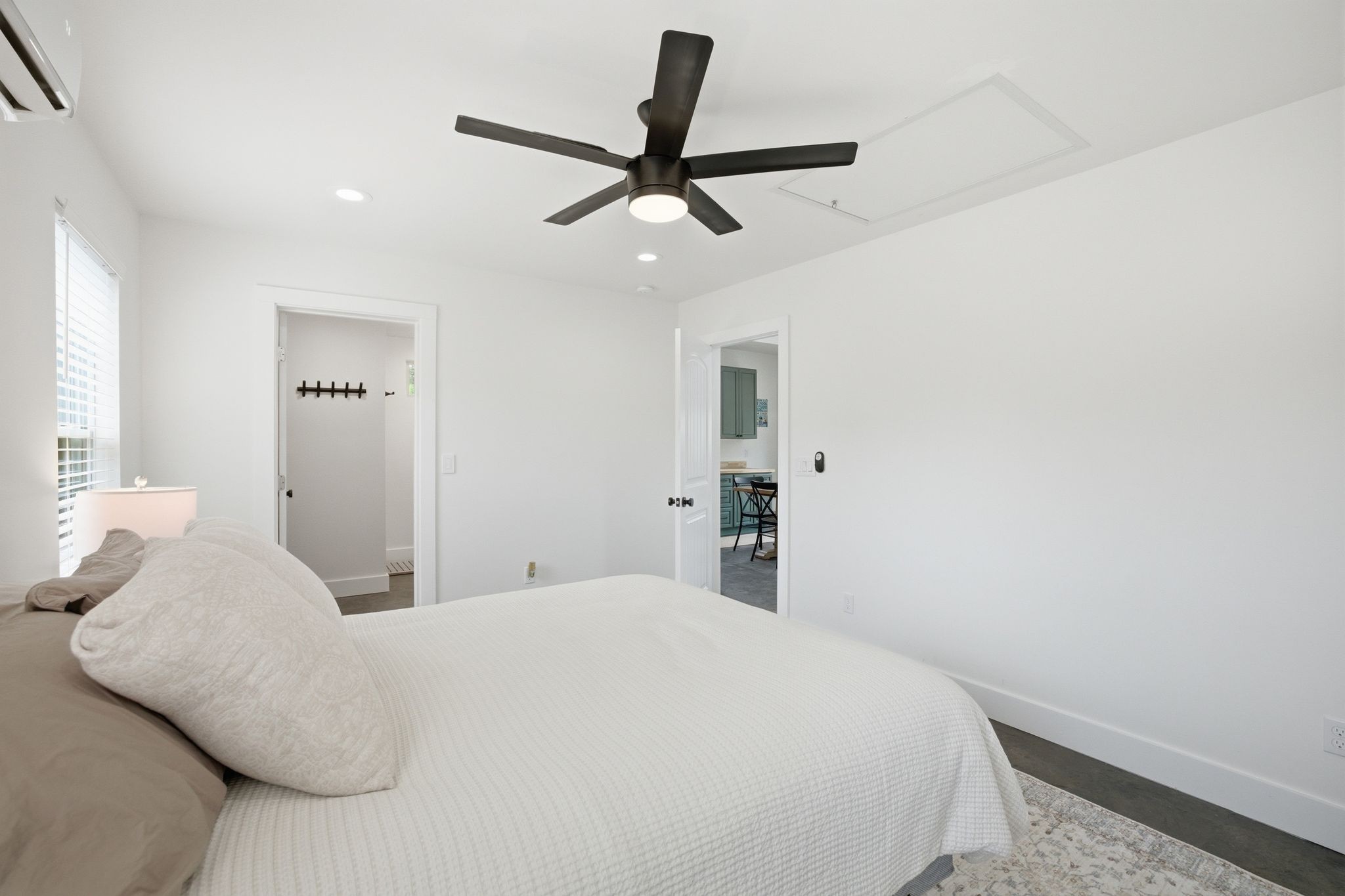 211 Fox Den Way Murfreesboro, TN 37130 - Photo 45 of 64 a bedroom with a large bed and a chandelier