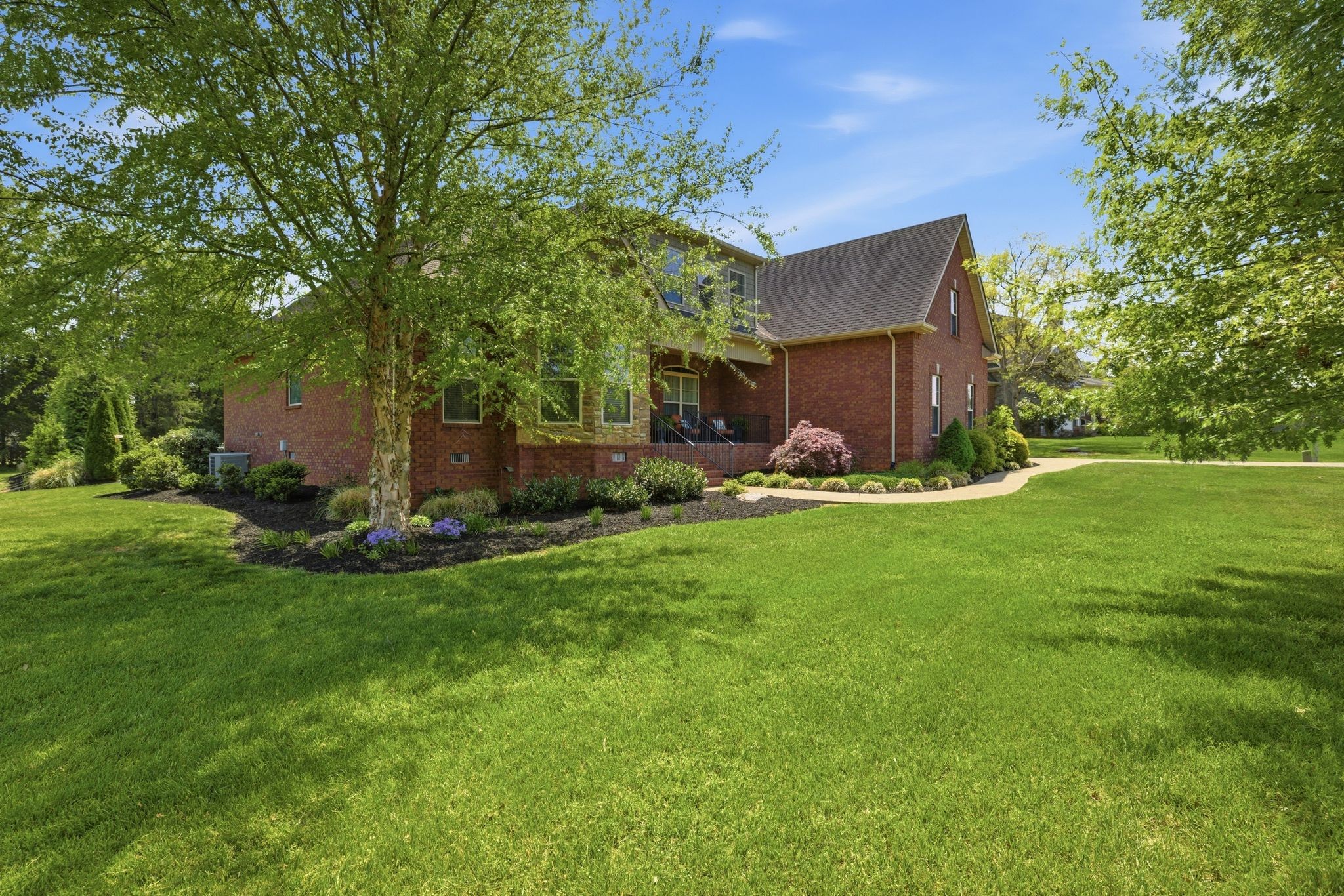 211 Fox Den Way Murfreesboro, TN 37130 - Photo 54 of 64 a view of a house with a yard and sitting area