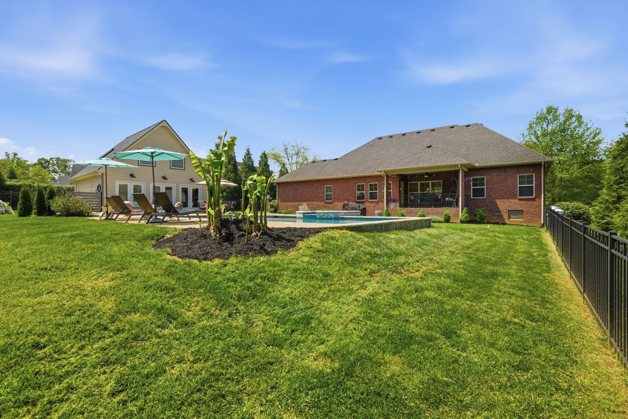 211 Fox Den Way Murfreesboro, TN 37130 - Photo 55 of 64 a front view of a house with garden