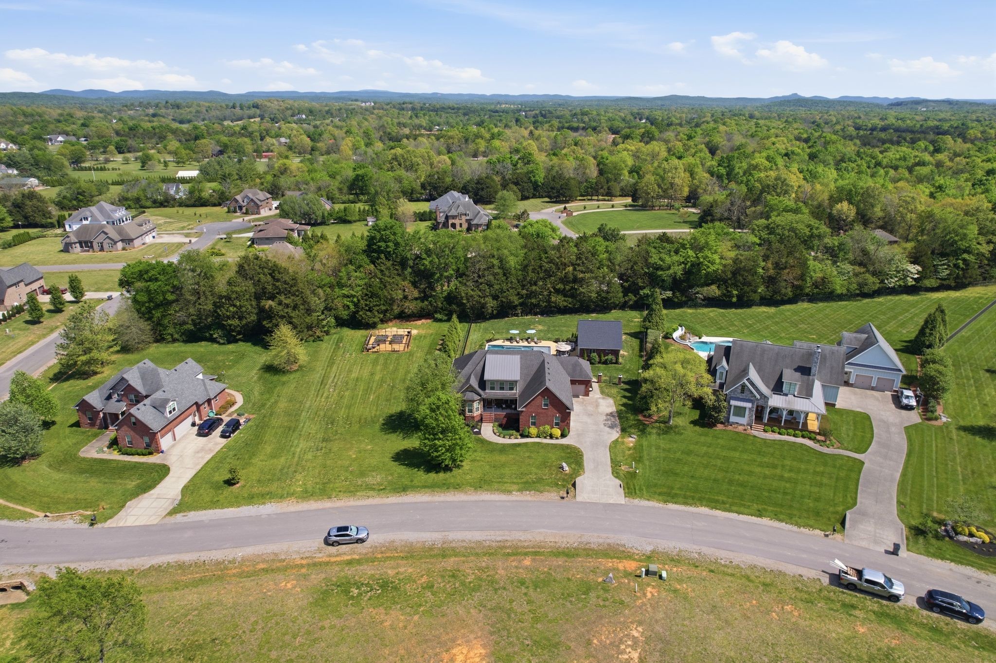 211 Fox Den Way Murfreesboro, TN 37130 - Photo 57 of 64 an aerial view of a house with a garden and lake view
