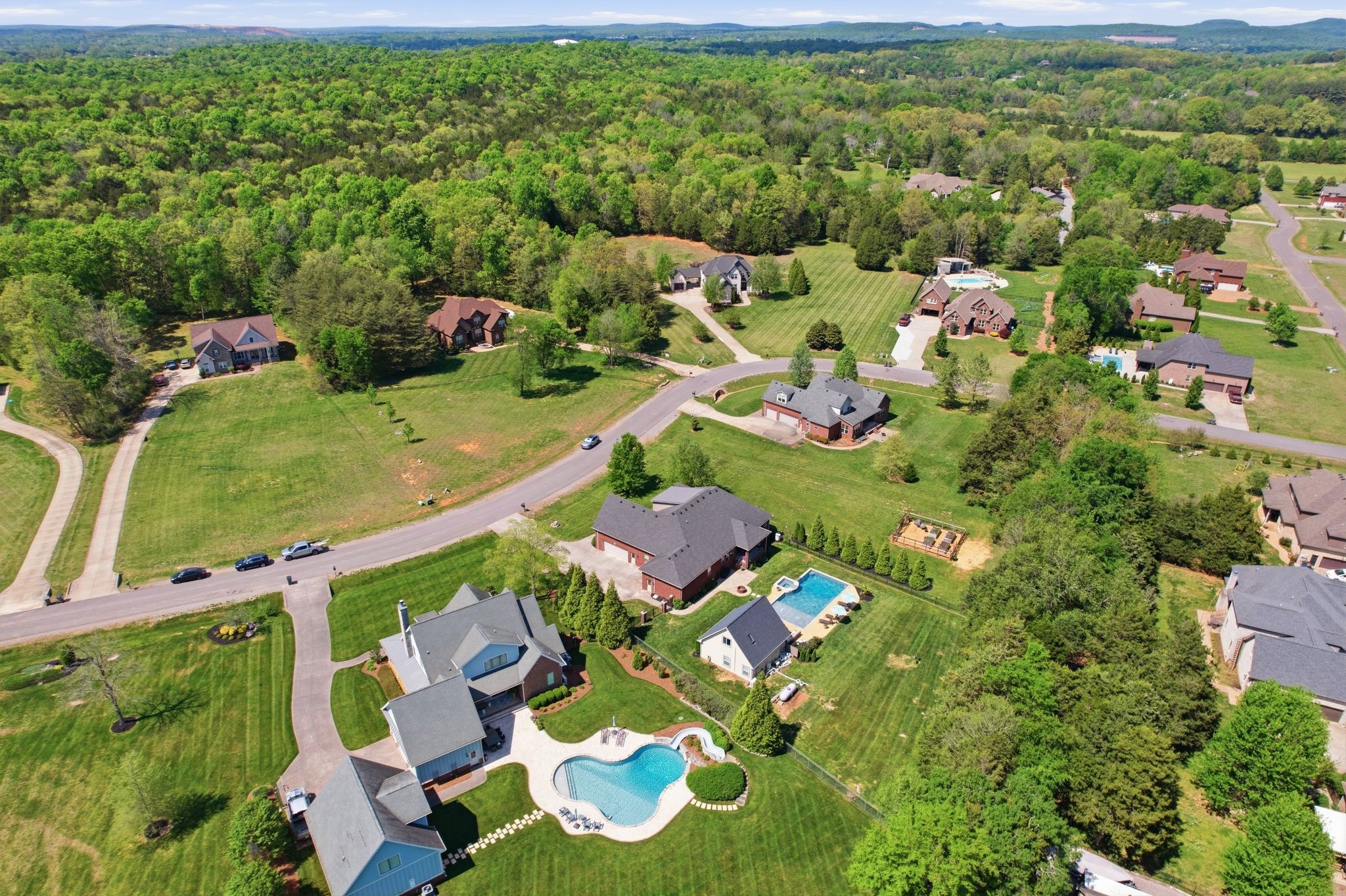 211 Fox Den Way Murfreesboro, TN 37130 - Photo 63 of 64 an aerial view of residential houses with outdoor space and trees