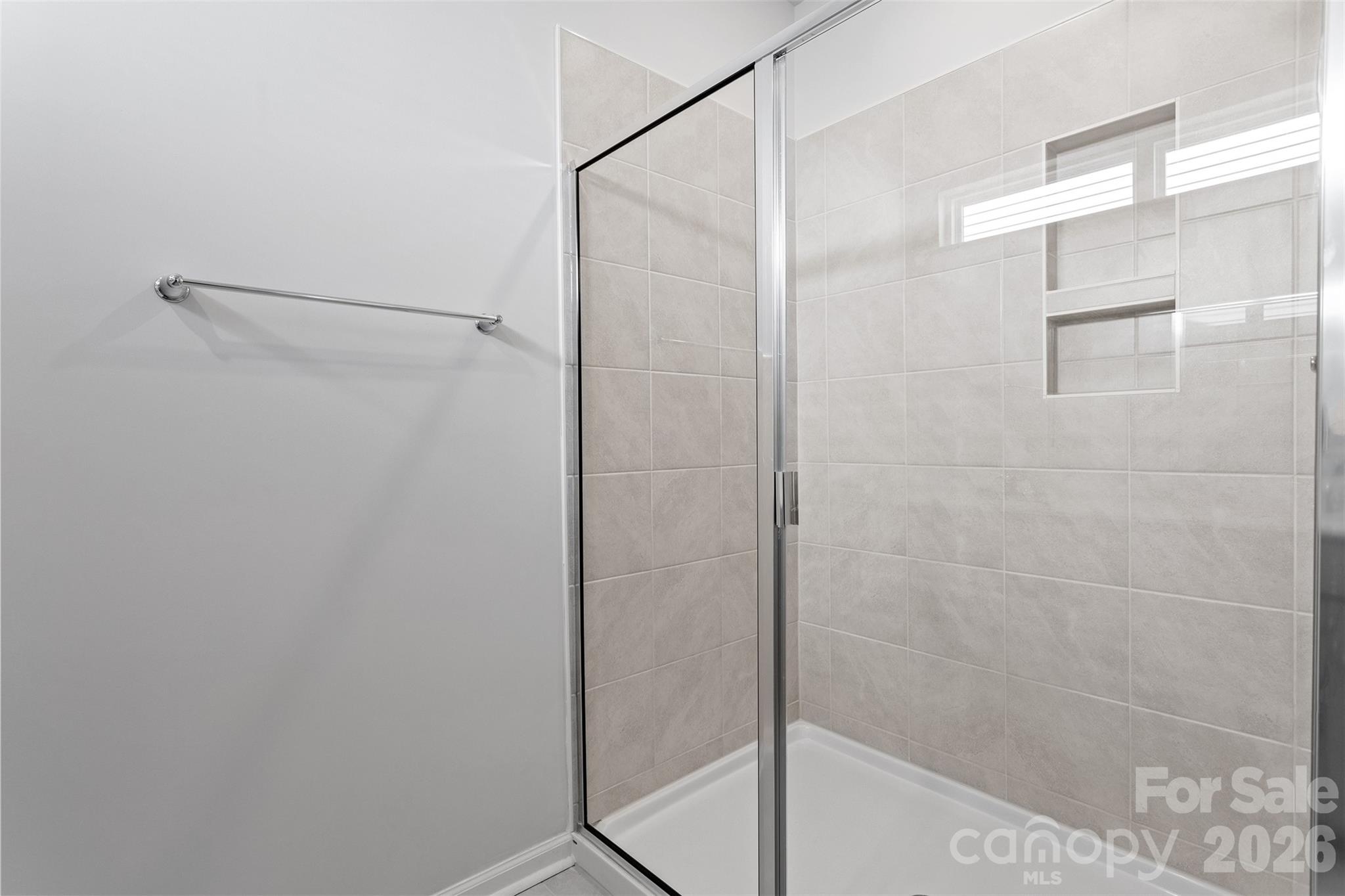 5835 Tuckaseegee Road, Unit 9 Charlotte, NC 28208 - Photo 20 of 29 a bathroom with a shower