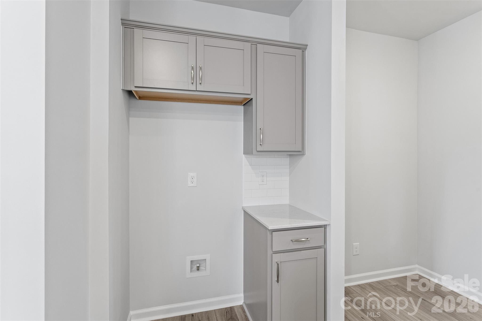 5835 Tuckaseegee Road, Unit 9 Charlotte, NC 28208 - Photo 9 of 29 a view of walk in closet with empty racks