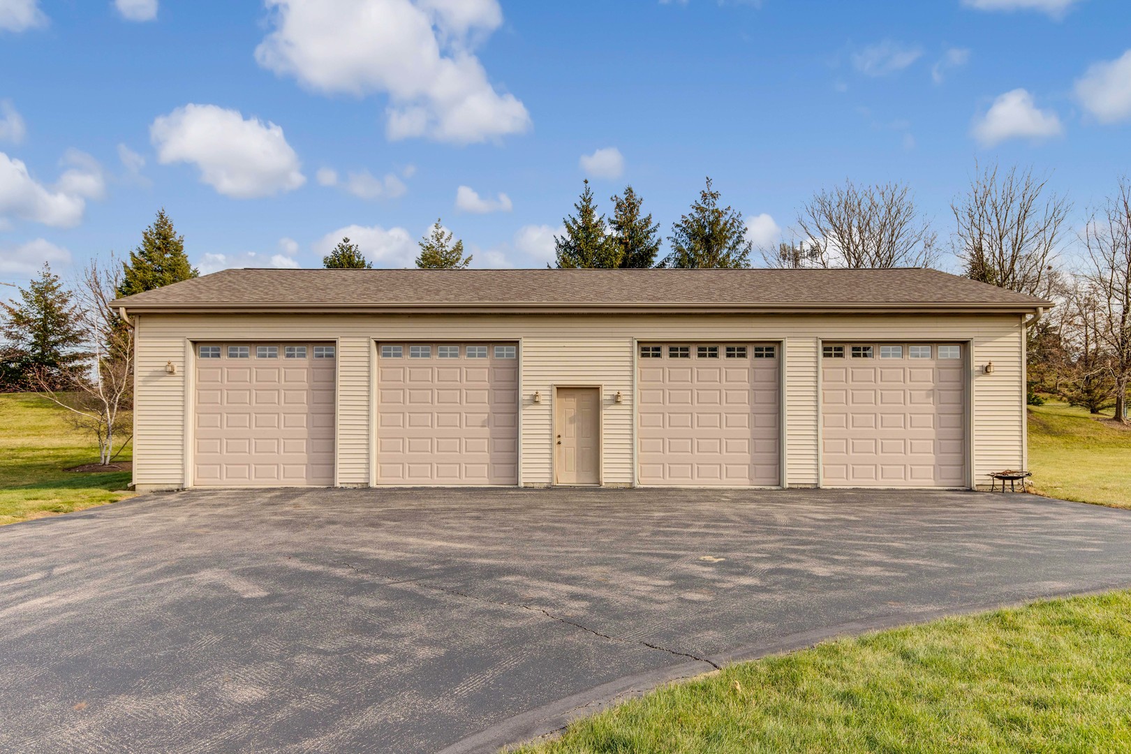 2479 Downing Court Gurnee, IL 60031 - Photo 21 of 21 a front view of a house with a garden