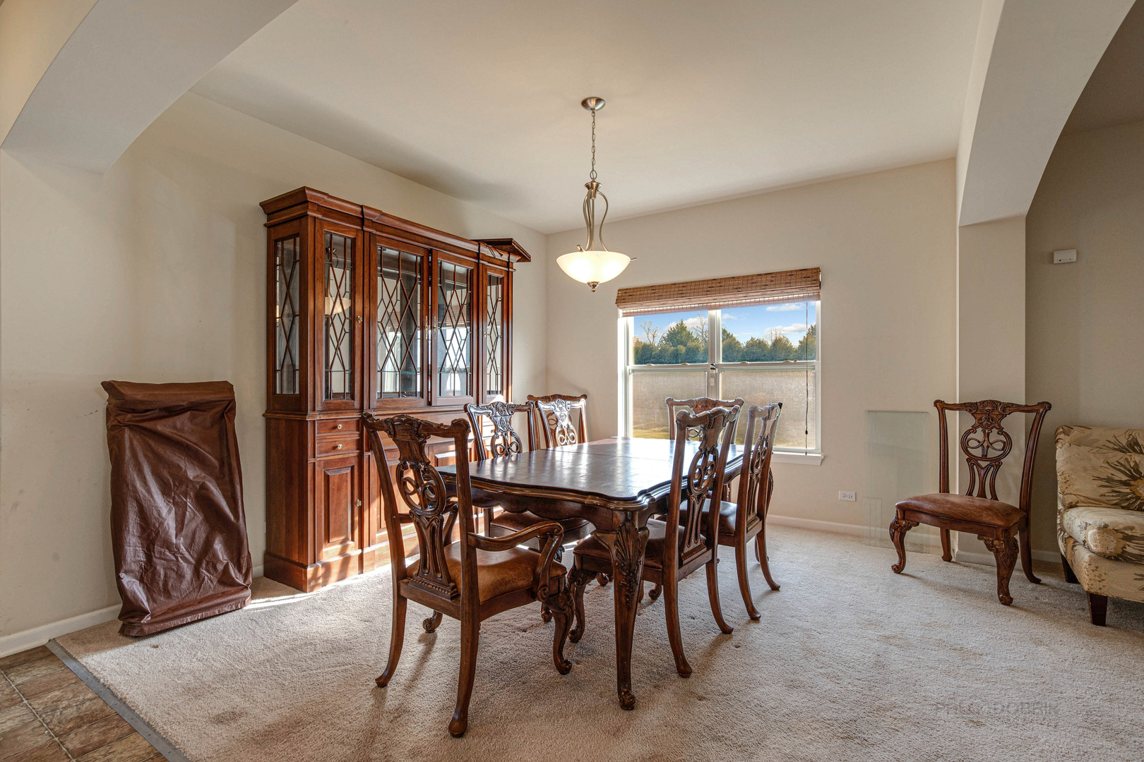2479 Downing Court Gurnee, IL 60031 - Photo 4 of 21 a view of a dining room with furniture and window