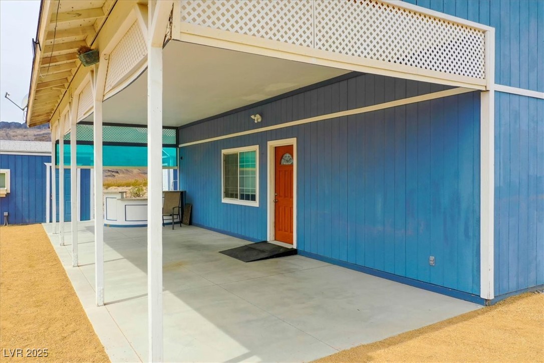 520 Burt Street Pahrump, NV 89060 - Photo 14 of 99 Entrance to property with a patio