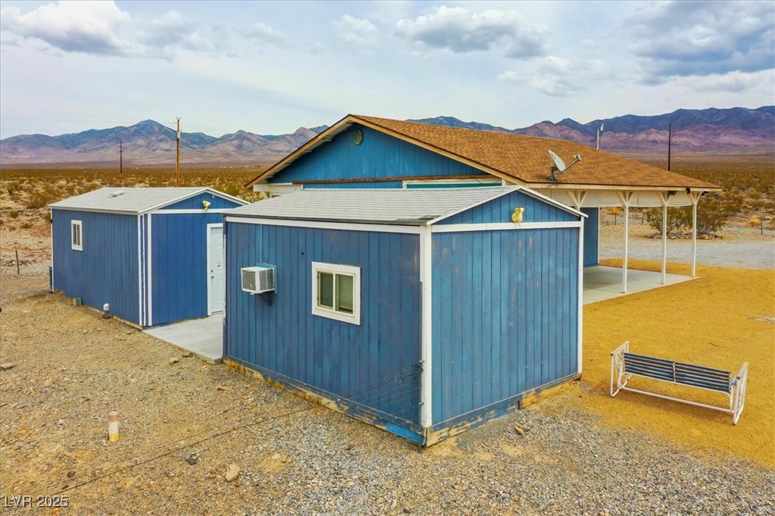 520 Burt Street Pahrump, NV 89060 - Photo 24 of 99 View of outdoor structure with a mountain view