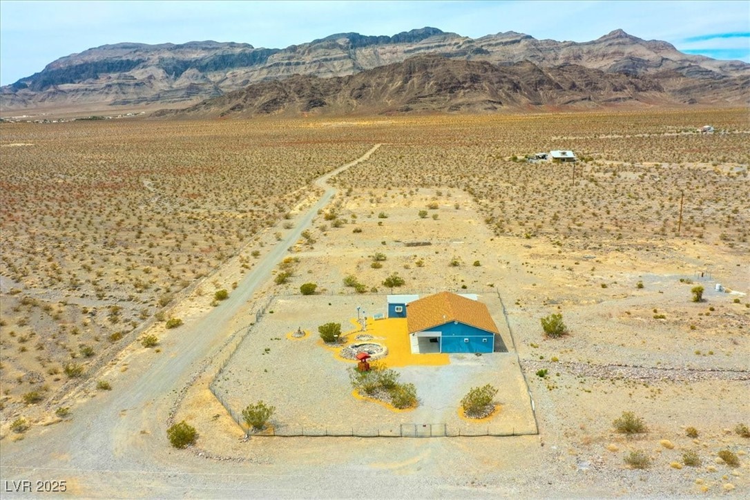 520 Burt Street Pahrump, NV 89060 - Photo 3 of 99 View of rural area featuring a mountainous background